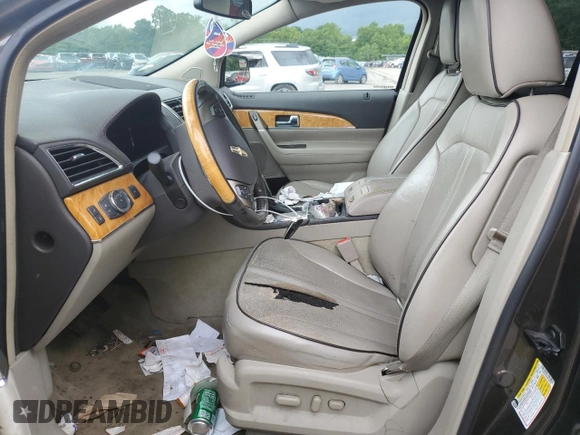 2011 Lincoln MKX z VIN 2LMDJ6JK5BBJ06463, wystawiony jako Copart lot #60041285 z przebiegiem 195 915 mil mil oraz Szkoda całkowita • Salvage title. Historia ofert i sprzedaży dostępna na DreamBid. Obrazek 7.