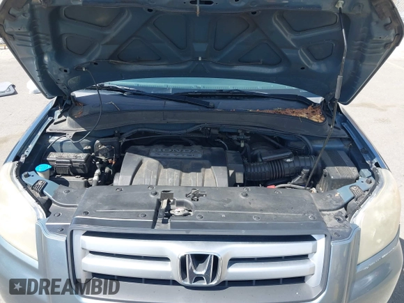 2007 Honda Pilot EX with VIN 2HKYF18447H520522, listed as a IAAI auction lot 42018937 with 128,401 mi miles. Bid and sale history available at carsss.com. Image 10.