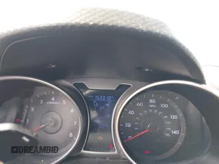 2012 Hyundai Veloster w/Gray Int with VIN KMHTC6AD3CU051395, listed as a IAAI auction lot 42489038 with 153,319 mi miles and . Bid and sale history available at DreamBid. Image 7.
