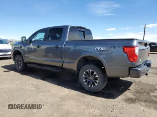 2016 Nissan Titan XD PRO-4X with VIN 1N6BA1F47GN504254, listed as a Copart auction lot 56670974 with 173,312 mi miles and Clean Title. Bid and sale history available at carsss.com. Image 2.