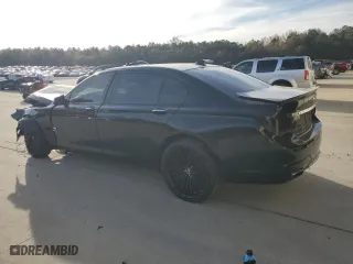2011 BMW 7 Series 740Li with VIN WBAKB4C54BC574973, listed as a Copart auction lot 82299024 with 0 mi miles and Salvage Title. Bid and sale history available at carsss.com. Image 2.
