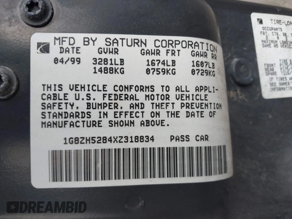 1999 Saturn SL with VIN 1G8ZH5284XZ318834, listed as a IAAI auction lot 41486518 with 178,227 mi miles. Bid and sale history available at carsss.com. Image 9.