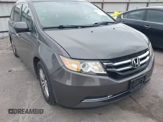 2014 Honda Odyssey EX-L with VIN 5FNRL5H64EB094171, listed as a IAAI auction lot 42140489 with 96,629 mi miles and . Bid and sale history available at DreamBid. Image 1.