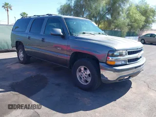 2002 Chevrolet Suburban LT z VIN 1GNFK16Z32J294238, wystawiony jako IAAI lot #42143758 z przebiegiem 175 468 mil mil oraz . Historia ofert i sprzedaży dostępna na DreamBid. Obrazek 1.