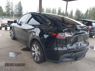 2023 Tesla Model Y Long Range with VIN 7SAYGDEE4PF789102, listed as a IAAI auction lot 41788860 with 88,457 mi miles and . Bid and sale history available at DreamBid. Image 3.