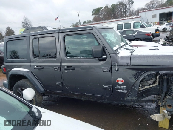 2019 Jeep Wrangler Unlimited Sport S with VIN 1C4HJXDG5KW505015, listed as a IAAI auction lot 41560088 with 54,193 mi miles and . Bid and sale history available at DreamBid. Image 13.