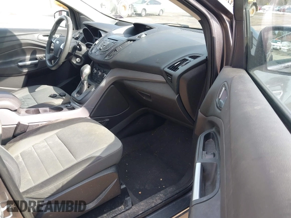2015 Ford Escape SE with VIN 1FMCU0GXXFUB99852, listed as a IAAI auction lot 41704198 with 84,735 mi miles. Bid and sale history available at carsss.com. Image 5.