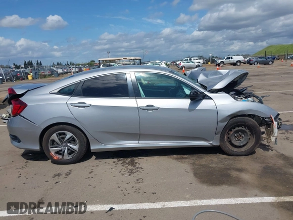 2020 Honda Civic LX with VIN 2HGFC2F63LH505525, listed as a IAAI auction lot 41920997 with Not Provided miles and . Bid and sale history available at DreamBid. Image 14.