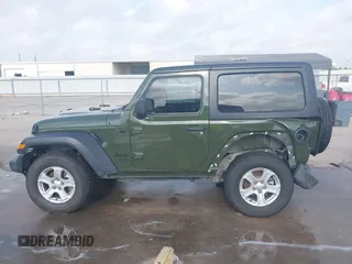 2021 Jeep Wrangler Sport with VIN 1C4GJXAN5MW852653, listed as a IAAI auction lot 42073214 with 53,834 mi miles and . Bid and sale history available at DreamBid. Image 15.