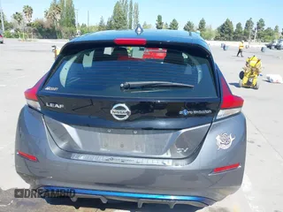 2019 Nissan LEAF SV z VIN 1N4AZ1CP6KC304997, wystawiony jako IAAI lot #42090564 z przebiegiem 54 069 mil mil oraz . Historia ofert i sprzedaży dostępna na DreamBid. Obrazek 16.