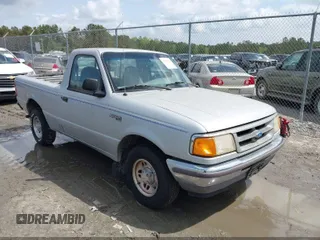 1997 Ford Ranger XLT with VIN 1FTCR10A9VUC47955, listed as a IAAI auction lot 42144050 with 213,615 mi miles and . Bid and sale history available at DreamBid. Image 1.