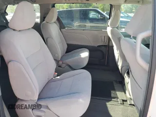 2015 Toyota Sienna LE with VIN 5TDJK3DC2FS126466, listed as a Copart auction lot 61165105 with 56,634 mi miles and Salvage title. Bid and sale history available at DreamBid. Image 11.