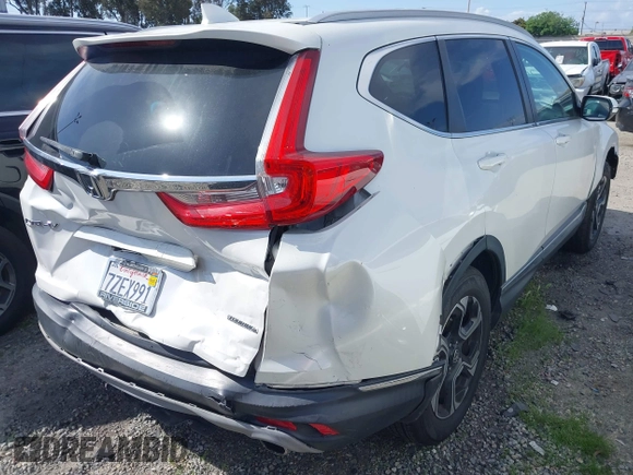 2017 Honda CR-V Touring with VIN 2HKRW1H96HH517669, listed as a IAAI auction lot 41653040 with 97,961 mi miles. Bid and sale history available at carsss.com. Image 4.