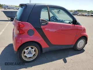 2009 Smart fortwo Pure with VIN WMEEJ31X49K322711, listed as a Copart auction lot 58749945 with 58,919 mi miles and Clean title. Bid and sale history available at DreamBid. Image 3.