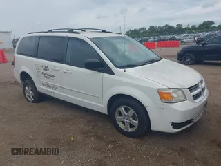 2010 Dodge Grand Caravan SE z VIN 2D4RN4DE6AR339829, wystawiony jako IAAI lot #42825346 z przebiegiem 96 360 mil mil oraz . Historia ofert i sprzedaży dostępna na DreamBid. Obrazek 1.