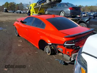 2023 Dodge Charger Scat Pack Widebody with VIN 2C3CDXGJ4PH670928, listed as a IAAI auction lot 41492124 with 64 mi miles and . Bid and sale history available at DreamBid. Image 3.