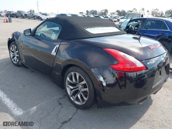 2010 Nissan 370Z Touring with VIN JN1AZ4FHXAM301421, listed as a IAAI auction lot 41642045 with 89,963 mi miles. Bid and sale history available at carsss.com. Image 3.