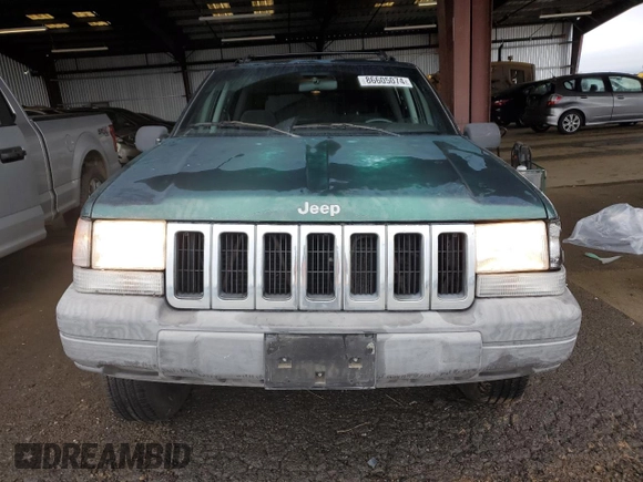 1997 Jeep Grand Cherokee TSi with VIN 1J4FX58S6VC602782, listed as a Copart auction lot 86605074 with 158,971 mi miles and Salvage Title. Bid and sale history available at carsss.com. Image 5.