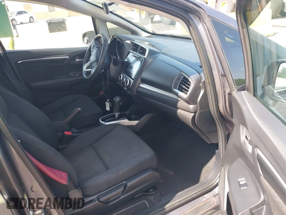 2015 Honda Fit EX-L z VIN 3HGGK5H89FM730013, wystawiony jako IAAI lot #42673309 z przebiegiem 142 660 mil mil oraz . Historia ofert i sprzedaży dostępna na DreamBid. Obrazek 5.