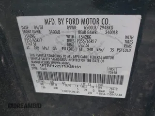 2007 Ford F-150 XL with VIN 1FTRF12257NA69161, listed as a IAAI auction lot 42195807 with 122,875 mi miles. Bid and sale history available at carsss.com. Image 9.