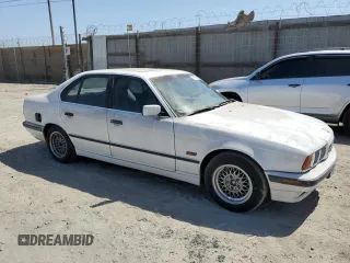 1995 BMW 5 Series 525i z VIN WBAHD6324SGK57242, wystawiony jako Copart lot #57287605 z przebiegiem Nie podano mil oraz Czysty tytuł • Clean title. Historia ofert i sprzedaży dostępna na DreamBid. Obrazek 4.