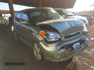 2011 Kia Soul + with VIN KNDJT2A24B7301775, listed as a IAAI auction lot 41623519 with 64,266 mi miles. Bid and sale history available at carsss.com. Image 1.