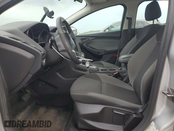 2012 Ford Focus SE with VIN 1FAHP3F2XCL202510, listed as a Copart auction lot 64066545 with 77,828 mi miles and Salvage title. Bid and sale history available at DreamBid. Image 7.