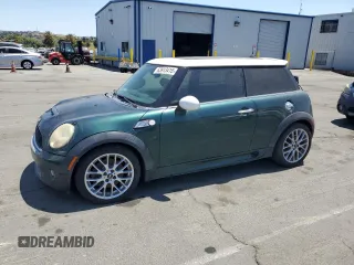 2009 MINI Hardtop S with VIN WMWMF73599TT96423, listed as a Copart auction lot 63913415 with 103,165 mi miles and Clean title. Bid and sale history available at DreamBid. Image 1.