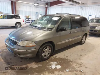 2003 Ford Windstar SE with VIN 2FMZA52413BB09700, listed as a IAAI auction lot 41037056 with 179,486 mi miles and . Bid and sale history available at DreamBid. Image 2.