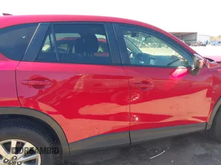 2016 Mazda CX-5 Touring with VIN JM3KE4CY0G0890309, listed as a IAAI auction lot 41890840 with 89,023 mi miles and . Bid and sale history available at carsss.com. Image 13.