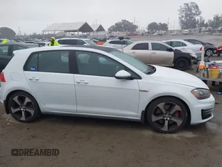 2017 Volkswagen Golf GTI S with VIN 3VW547AU6HM016813, listed as a IAAI auction lot 41783957 with 125,052 mi miles. Bid and sale history available at carsss.com. Image 13.