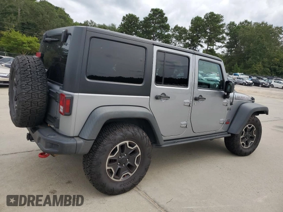2013 Jeep Wrangler Unlimited Rubicon 10th Anniversary z VIN 1C4HJWFG3DL703331, wystawiony jako Copart lot #70823154 z przebiegiem 148 860 mil mil oraz Szkoda całkowita • Salvage title. Historia ofert i sprzedaży dostępna na DreamBid. Obrazek 3.