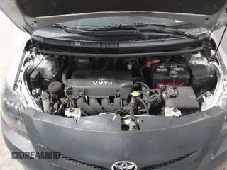 2008 Toyota Yaris with VIN JTDBT903781251568, listed as a IAAI auction lot 42090260 with 264,356 mi miles. Bid and sale history available at carsss.com. Image 10.