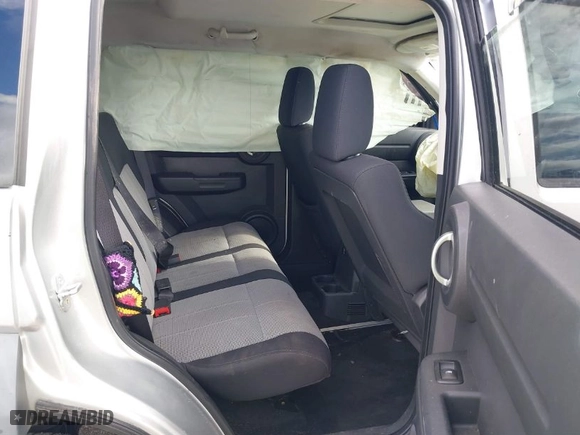 2007 Dodge Nitro SXT with VIN 1D8GT28K97W683073, listed as a IAAI auction lot 41123780 with 191,877 mi miles. Bid and sale history available at carsss.com. Image 8.