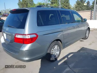 2007 Honda Odyssey EX-L with VIN 5FNRL38727B028976, listed as a IAAI auction lot 42138341 with 169,936 mi miles. Bid and sale history available at carsss.com. Image 4.
