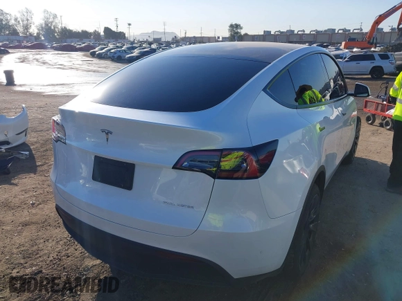2023 Tesla Model Y Long Range with VIN 7SAYGDEE1PA128818, listed as a IAAI auction lot 41622062 with 19,089 mi miles. Bid and sale history available at carsss.com. Image 4.
