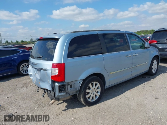 2013 Chrysler Town & Country Touring with VIN 2C4RC1BG3DR736862, listed as a IAAI auction lot 42131041 with 130,505 mi miles and . Bid and sale history available at DreamBid. Image 4.