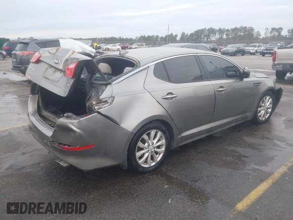 2014 Kia Optima EX z VIN 5XXGN4A75EG290132, wystawiony jako IAAI lot #41292706 z przebiegiem 155 793 mil mil oraz . Historia ofert i sprzedaży dostępna na DreamBid. Obrazek 4.