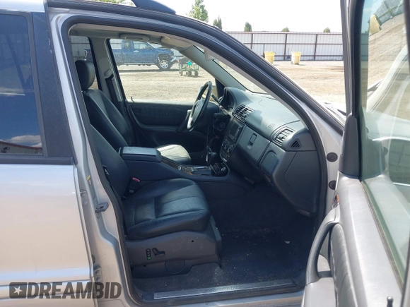 2005 Mercedes-Benz M 500 with VIN 4JGAB75EX5A536561, listed as a IAAI auction lot 40088398 with 206,184 mi miles and . Bid and sale history available at DreamBid. Image 5.
