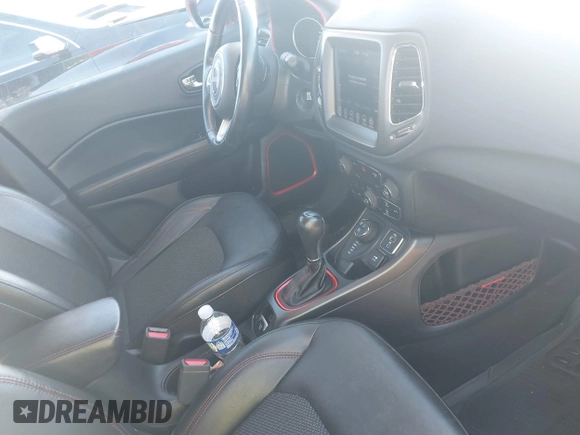 2020 Jeep Compass Trailhawk with VIN 3C4NJDDB6LT220868, listed as a IAAI auction lot 41600066 with 51,151 mi miles and . Bid and sale history available at carsss.com. Image 5.