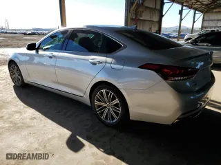 2018 Genesis G80 3.8L with VIN KMHGN4JE4JU215890, listed as a Copart auction lot 50455605 with 57,043 mi miles and Salvage Title. Bid and sale history available at carsss.com. Image 2.
