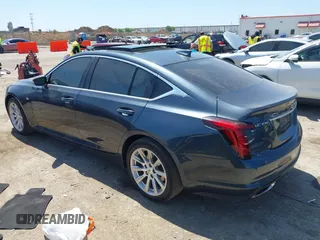2021 Cadillac CT5 Luxury z VIN 1G6DW5RKXM0144424, wystawiony jako IAAI lot #41985803 z przebiegiem 65 555 mil mil oraz . Historia ofert i sprzedaży dostępna na DreamBid. Obrazek 3.