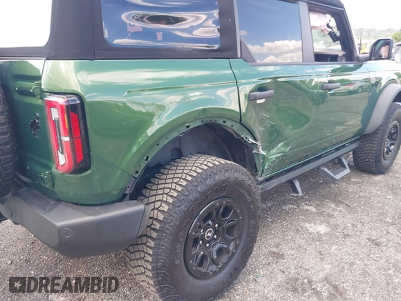 2023 Ford Bronco with VIN 1FMEE5DP0PLB80676, listed as a IAAI auction lot 42210054 with 6,796 mi miles and . Bid and sale history available at DreamBid. Image 6.
