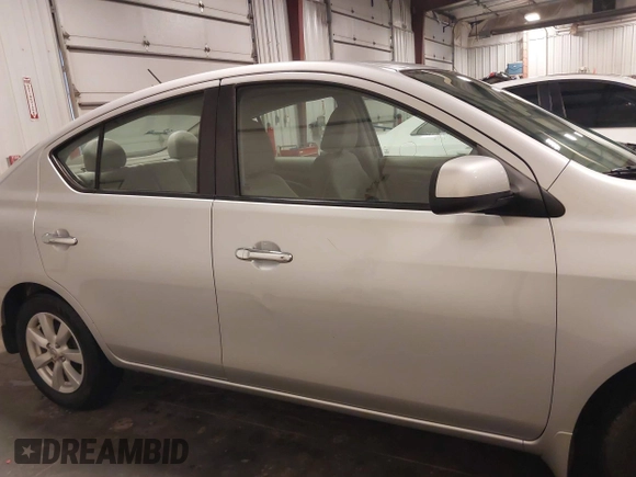 2012 Nissan Versa SV with VIN 3N1CN7AP2CL938479, listed as a IAAI auction lot 41918877 with 150,000 mi miles and . Bid and sale history available at DreamBid. Image 13.
