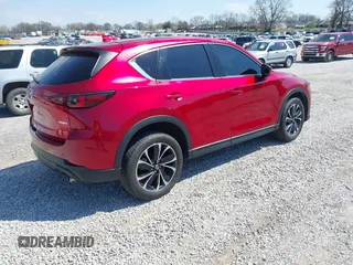 2022 Mazda CX-5 2.5 S Premium Package with VIN JM3KFBDM5N1532837, listed as a IAAI auction lot 41869721 with 59,249 mi miles. Bid and sale history available at carsss.com. Image 4.