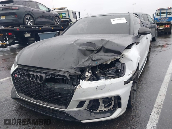2018 Audi RS 5 z VIN WUAPWAF5XJA905043, wystawiony jako IAAI lot #41978868 z przebiegiem 60 838 mil mil oraz . Historia ofert i sprzedaży dostępna na DreamBid. Obrazek 6.