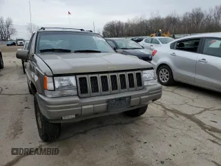 1997 Jeep Grand Cherokee Limited with VIN 1J4GZ78Y3VC568413, listed as a Copart auction lot 86171124 with 104,558 mi miles and Salvage Title. Bid and sale history available at carsss.com. Image 5.