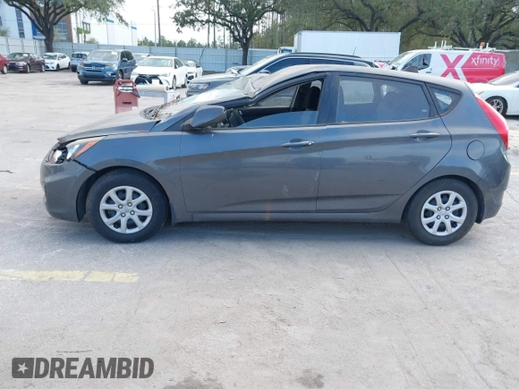 2012 Hyundai Accent GS with VIN KMHCT5AE7CU050253, listed as a IAAI auction lot 40601479 with 88,734 mi miles. Bid and sale history available at carsss.com. Image 14.