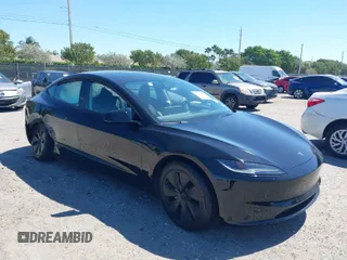2024 Tesla Model 3 with VIN 5YJ3E1EA4RF745385, listed as a IAAI auction lot 41772450 with 11,856 mi miles. Bid and sale history available at carsss.com. Image 1.