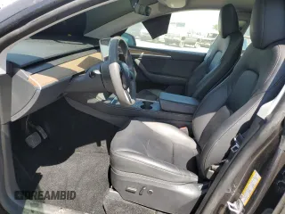 2024 Tesla Model Y z VIN 7SAYGDED7RF050963, wystawiony jako Copart lot #60683895 z przebiegiem 23 100 mil mil oraz Czysty tytuł • Clean title. Historia ofert i sprzedaży dostępna na DreamBid. Obrazek 7.